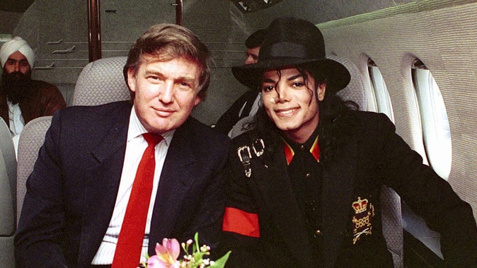 Donald Trump with Michael Jackson, illustrating the President's attempt to counter racism allegations.