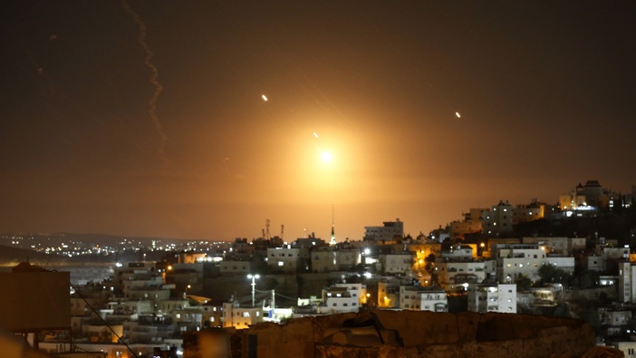Many rockets, fired from Iran, are seen over Jerusalem from Hebron, West Bank on October 01, 2024. The Israeli army announced that missiles were fired from Iran towards Israel and sirens were heard across the country, especially in Tel Aviv. (Photo by Wisam Hashlamoun/Anadolu via Getty Images)