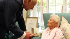 King Charles chats with British woman Ethel Caterham, the world's oldest person who turned 116 last month. Photo / Royal Family