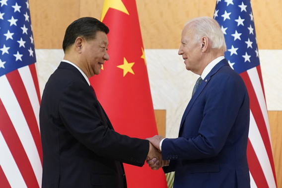 U.S. President Joe Biden, right, and Chinese President Xi Jinping shake hands before their meeting on the sidelines of the G20 summit meeting. Photo / AP