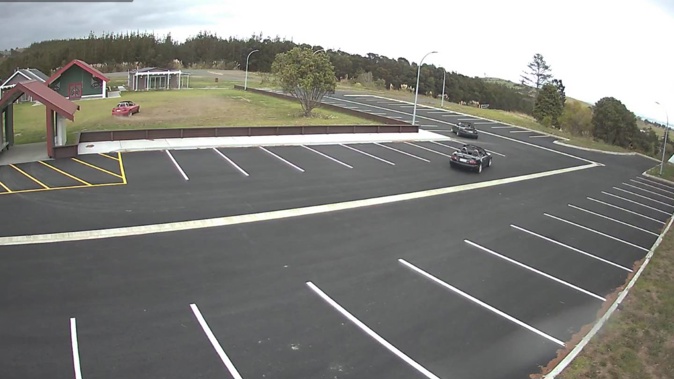 CCTV security video shows a vehicle doing burnouts on the lawn of the Te Aroha Pā marae. Photo / Supplied