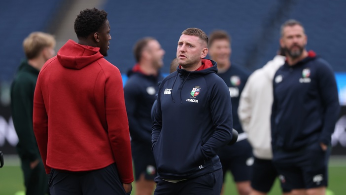 Finn Russell (R) talks to Maro Itoje, the Lions captain, during the British & Irish Lions captain's run at the MCG Stadium on July 25, 2025 in Melbourne, Australia. (Photo by David Rogers/Getty Images)