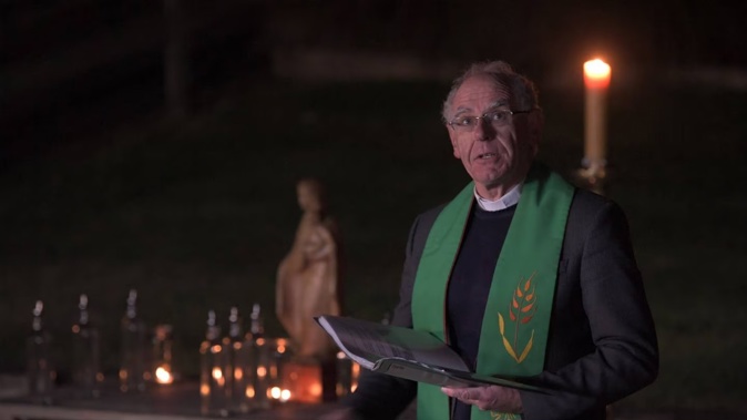 Bishop Michael Dooley at a pre-dawn blessing of the renamed Trinity Catholic College. Photo / Stephen Jaquiery