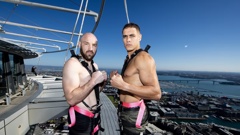 New Zealand cruiserweight boxer David Nyika Stands on the Skywalk up the Sky Tower with his opponent Blake Caparello to promote their upcoming fight in September. Photo / NZ Herald