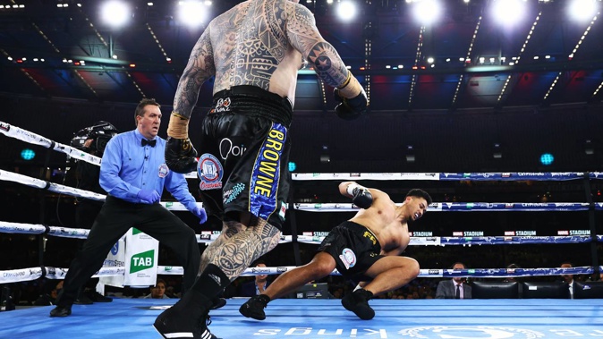 Lucas Browne knocks down Junior Fa during their heavyweight fight. Photo / Getty