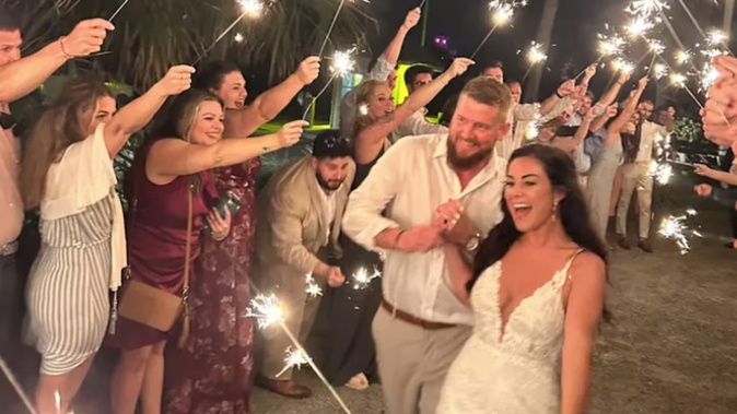 Aric and Samantha Hutchinson had just tied the knot when tragedy struck. Photo / GoFundMe
