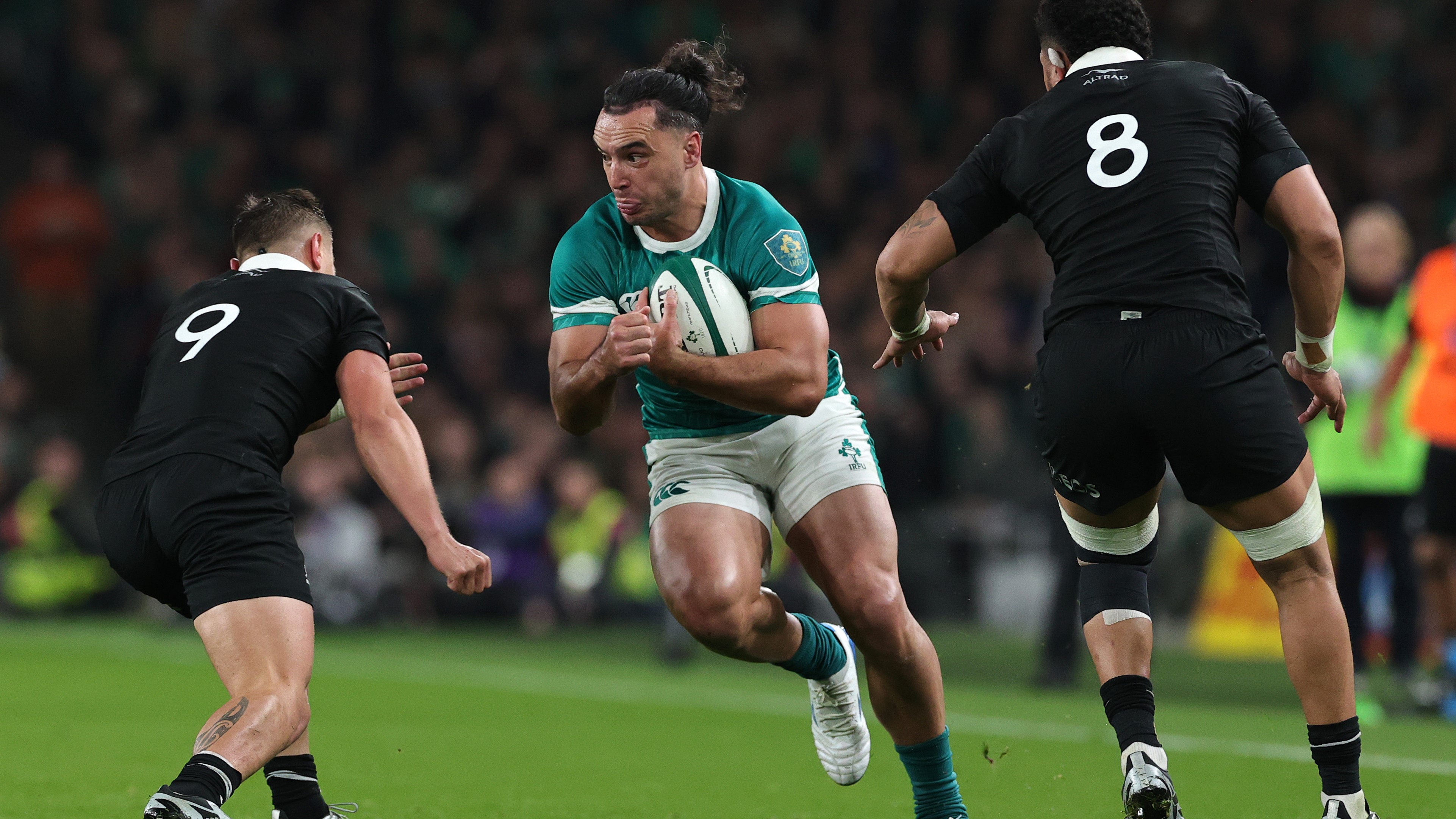 James Lowe of Irelandruns at Cortez Ratima of New Zealand during the Autumn Nations Series 2025 match between Ireland and New Zealand All Blacks at Aviva Stadium on November 08, 2024 in Dublin, Ireland. (Photo by David Rogers/Getty Images)
