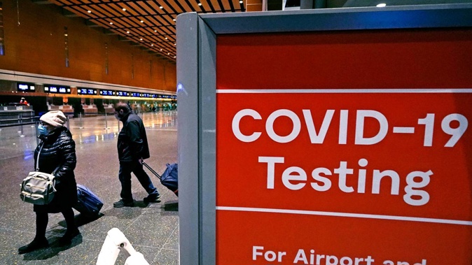 Covid-19 tests before entering the US were ditched earlier this week. Photo / AP