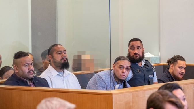 Tevita Fangupo (left), Toni Finau and Tevita Kulu, with Halane Ikiua at the far right, during their 2019 sentencing in the High Court at Auckland. (Photo / Peter Meecham)