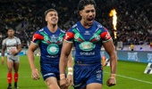 Alofi’ana Khan-Pereira, of the Warriors, celebrates scoring against the Dolphins. Photo / Photosport