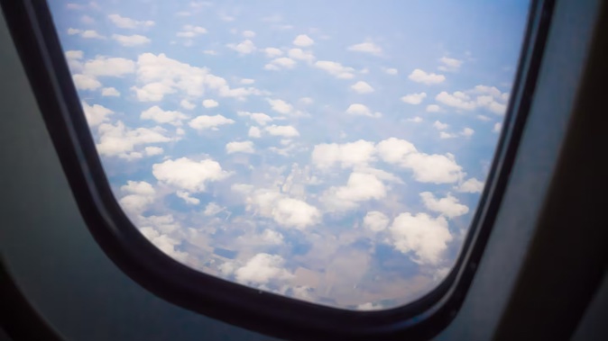 One passenger was hospitalised and six others received injuries after a flight was hit by severe turbulence. Photo / 123rf