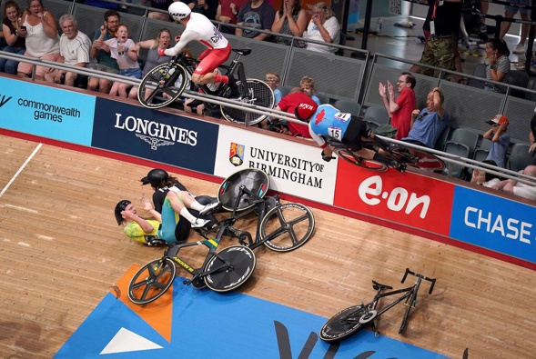 Matt Walls crashes into the crowd at the velodrome. Photo / AP