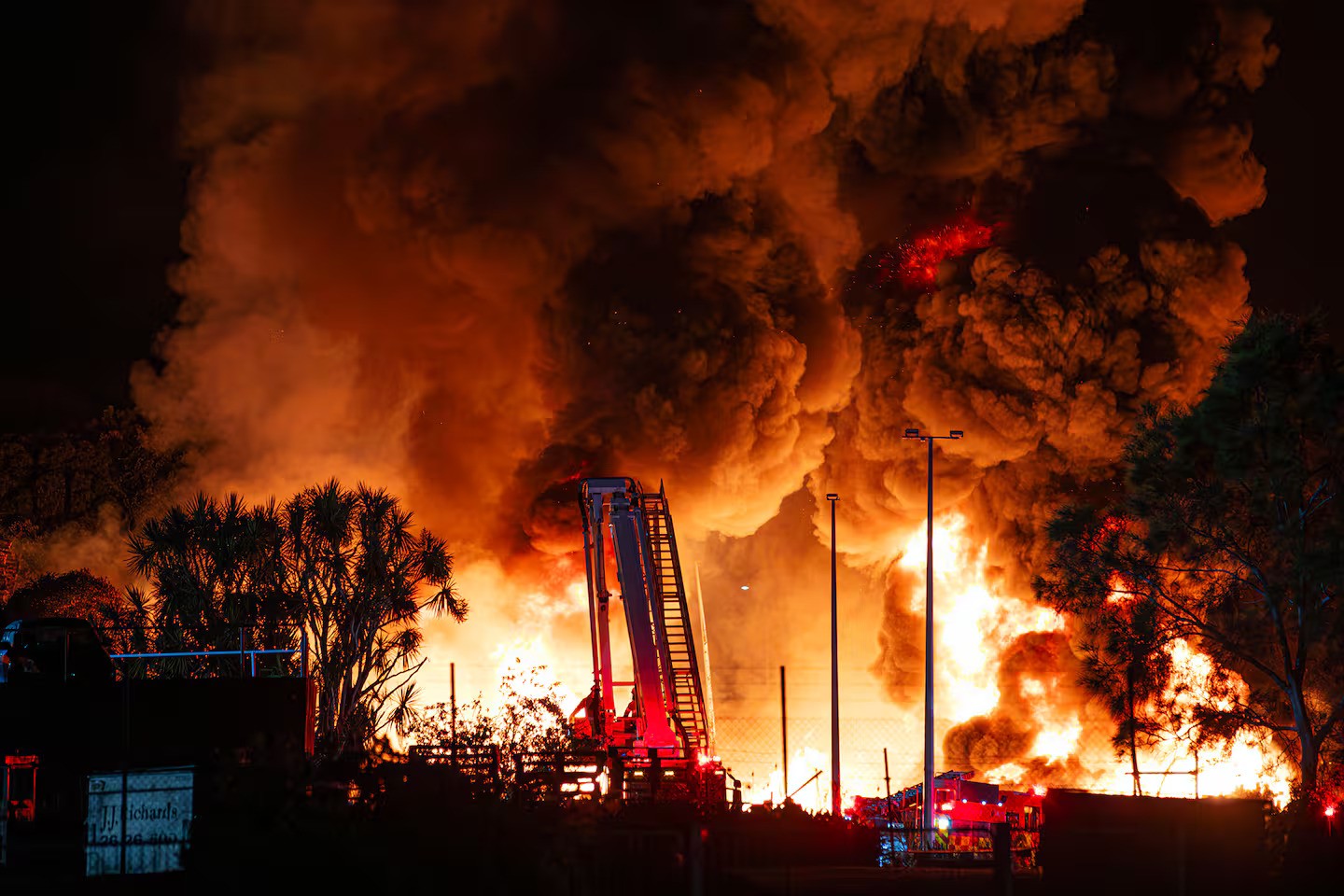 Huge clouds of smoke filled the skies over Waiuku last night. Photo / Hayden Woodward