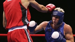 Adam Forsyth of Australia throws a punch against opponent during the Athens 2004 Summer Olympic Games. Photo / Getty Images
