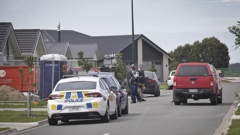 Police cordoned off houses on Harding Drive, Pāpāmoa East, after a stabbing incident on September 22, 2018. Photo / Andrew Warner