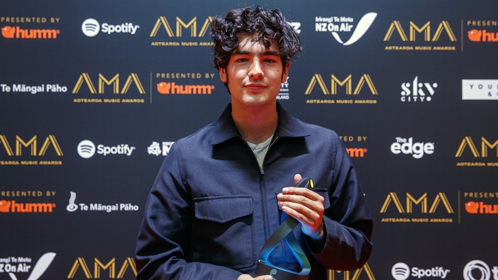 Harper Finn poses with the award for Breakthrough Artist in the media room during the 2021 Aotearoa Music Awards at the Aotea Centre on December 17, 2021 in Auckland, New Zealand. (Photo by Dave Rowland/Getty Images)
