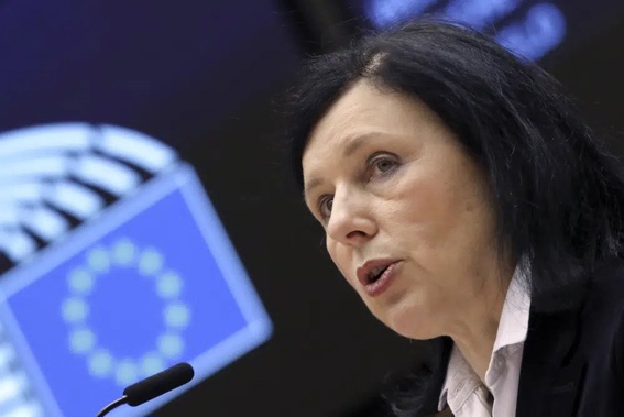 European Commissioner for Values and Transparency Vera Jourova addresses the plenary at the European Parliament in Brussels, Thursday, March 25, 2021. The European Union is pushing online platforms like Google and Meta to step up the fight against false information by adding labels to text, photos and other content generated by artificial intelligence, EU Commission Vice President Vera Jourova said Monday. (Yves Herman, Pool via AP, File)