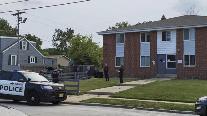 A 19-year-old woman was using a handgun's laser sight as a cat toy when she accidentally shot a friend, according to prosecutors. (Photo / AP)