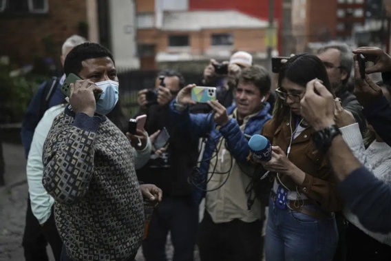 Manuel Ranoque, father of two of the youngest Indigenous children who survived an Amazon plane crash that killed three adults, and then braved the jungle for 40 days before being found alive, speaks to the media from the entrance of the military hospital where the children are receiving medical attention, in Bogota, Colombia, Sunday, June 11, 2023. (AP Photo/Ivan Valencia)