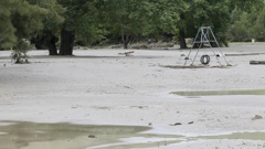 Esk River silt coats a playground in the immediate aftermath of Cyclone Gabrielle