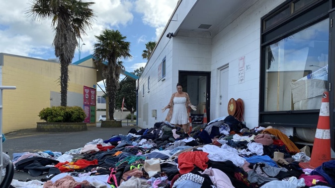 Melissa Marshall arrived at work to find more than 20 black rubbish bags flying around the carpark of the Mount Maunganui site on Saturday morning. Photo / Aleyna Martinez