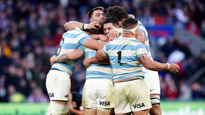 Argentina players celebrate following their win at Twickenham. Photo / Getty