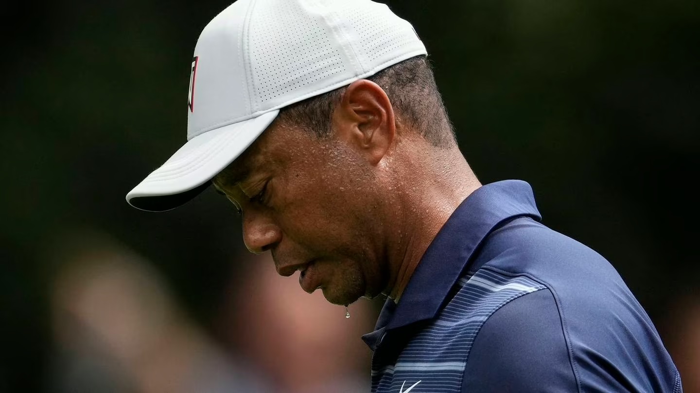 Tiger Woods walks up the fairway on the first hole during the second round of the Masters. Photo / AP