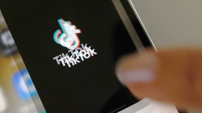 TikTok now says it will "go dark" for its American users as soon as the January 19 ban goes into effect. Experts had expected it to disappear from app stores but still work on people's phones for several months until the lack of updates saw it become unstable. Photo / Getty