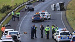 Traffic was backed up to Albany after Police closed the Northern Motorway south of Silverdale after a two-car crash. Photo / Hayden Woodward