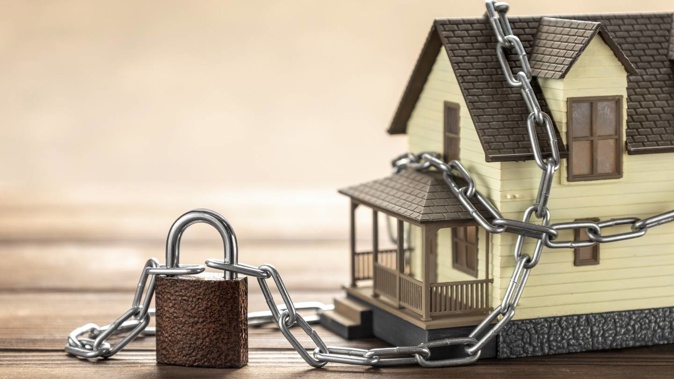 A husband's failure to pay his taxes has cost his partner her home. Photo / 123RF