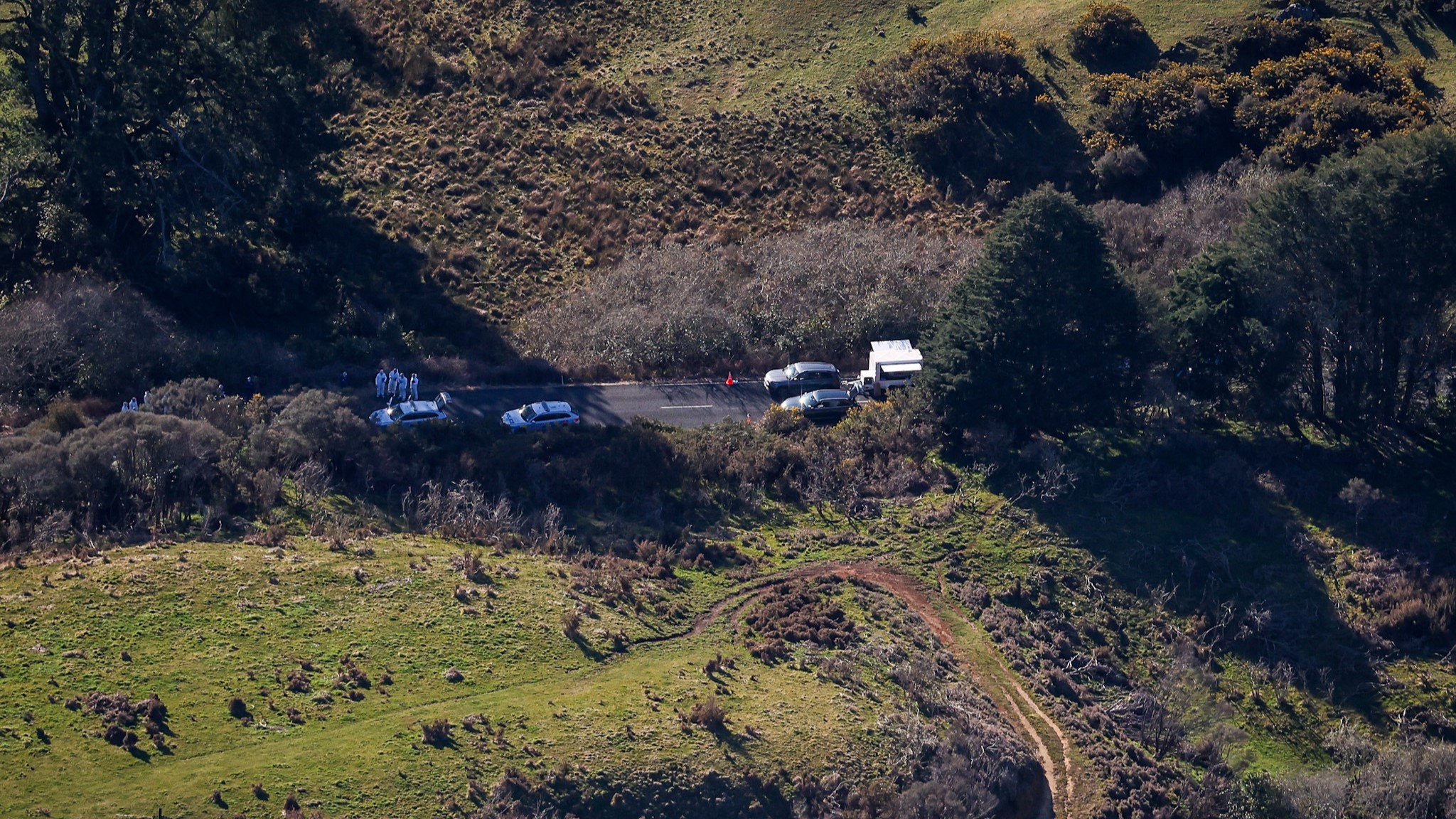 Police at the scene of the shootout with Tom Phillips. Photo / Mike Scott