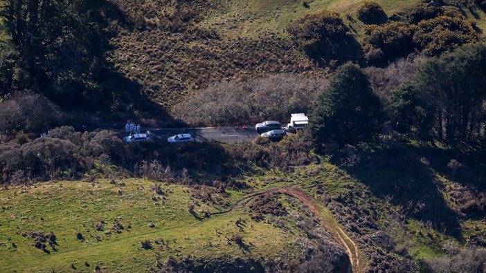 Police at the scene of the shootout with Tom Phillips. Photo / Mike Scott