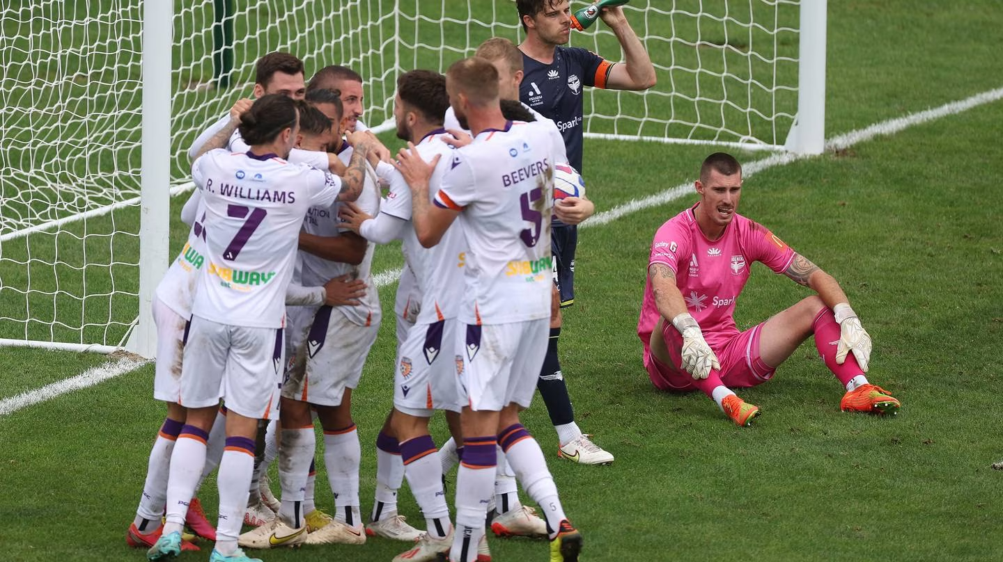 Wellington Phoenix goalkeeper Oli Sail reacts as the Perth Glory celebrate a late equaliser. Photo / Photosport