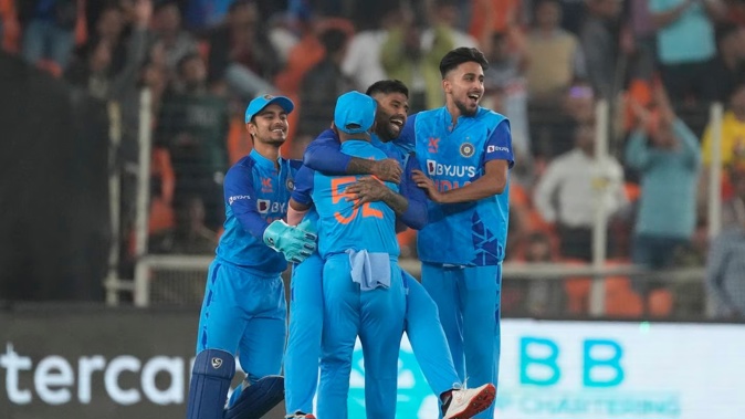 India's players celebrate wicket of New Zealand's Finn Allen during the third T20 international cricket match in Ahmedabad, India. Photo / AP