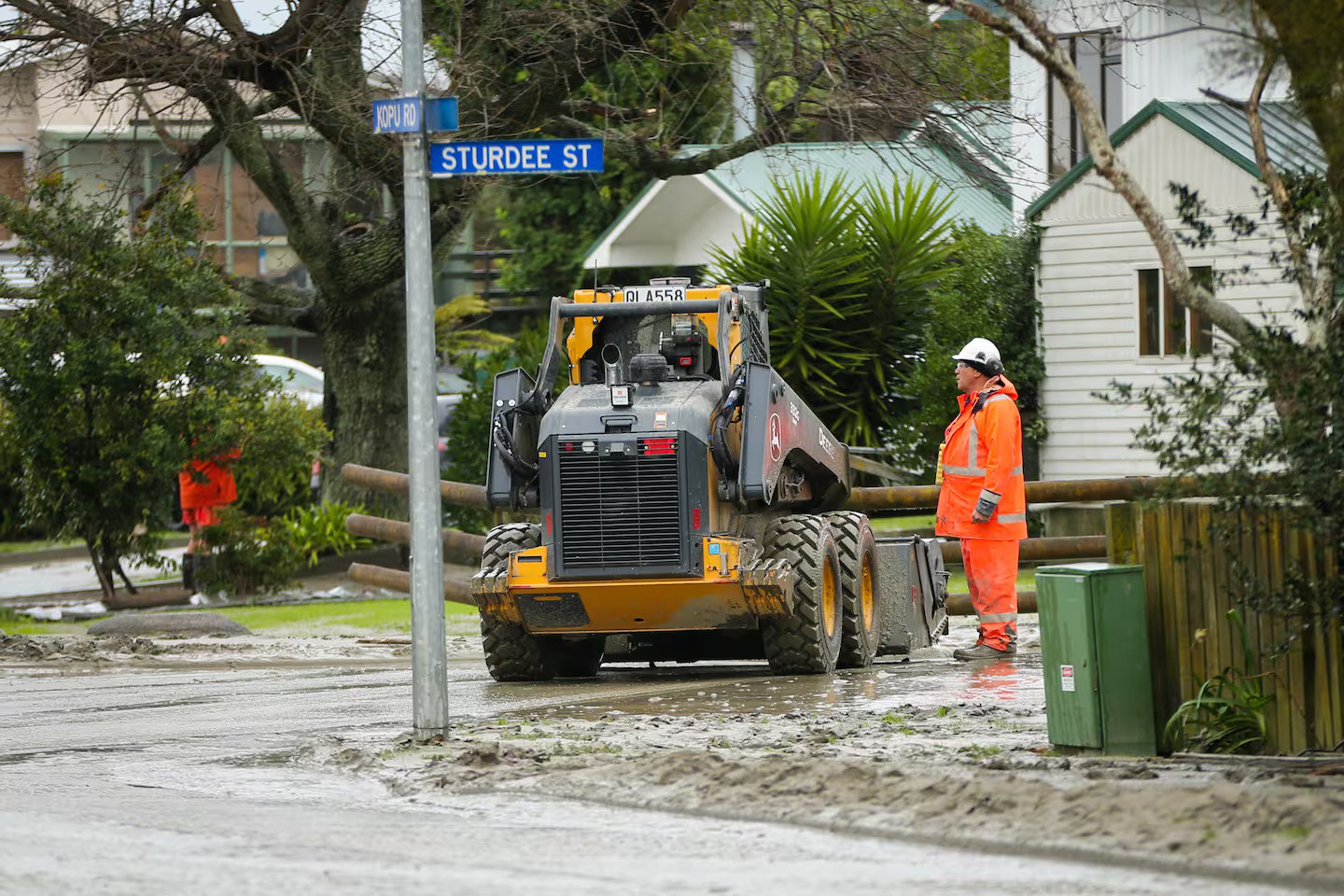 Crews cleaning up flood-hit Wairoa last week. Photo / Paul Taylor 