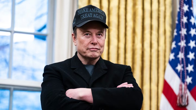 Elon Musk speaks with US President Donald Trump and reporters in the Oval Office at the White House on February 11. Photo / Jabin Botsford / The Washington Post