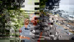 Pensioners Owen and Jane Hayward have refused to sell their Ōrākei home to developers Equinox Group, which wants to build 700 luxury apartments on the waterfront site. Photo / Michael Craig