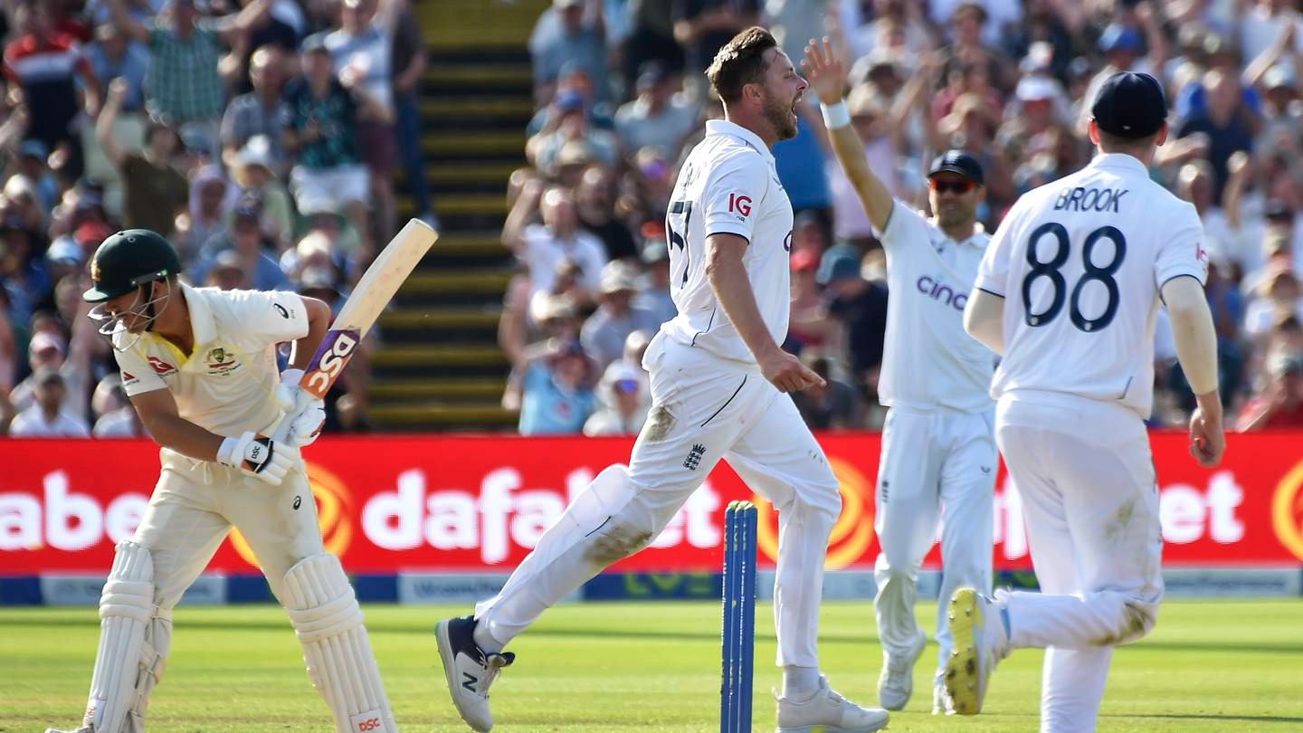 England's Ollie Robinson, centre, celebrates after taking the wicket of Australia's David Warner. Photo / AP