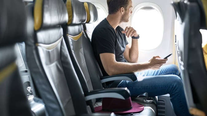 A man asked Reddit whether he was in the wrong for boarding a flight without his wife, who was running late. Photo / 123f