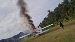 The Susi Air plane that Phillip Mehrtens was piloting torched by rebels. Photo / TPNPB