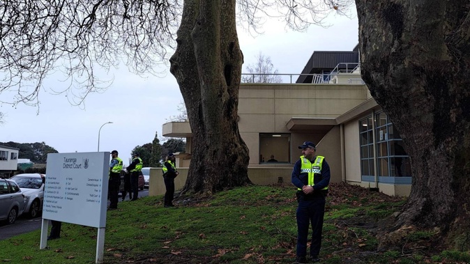 High police presence at the Tauranga courthouse today. Photo / Sandra Conchie