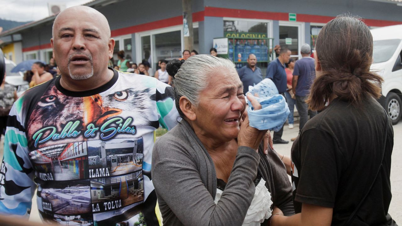 Relatives of inmates react as they wait for news about their loved ones outside the Centro Femenino de Adaptacion Social women's prison on Tuesday. Fredy Rodriguez/Reuters