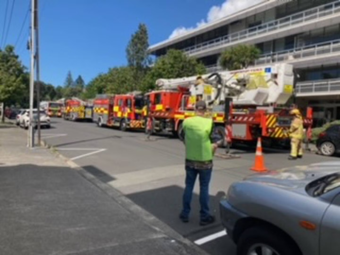 Six fire command units at a building in Grafton investigating the source of heavy smoke. Photo / Emma Wild