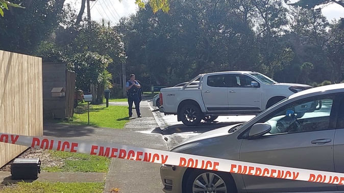 A cul de sac on Auckland's North Shore is under a police cordon after an early morning shooting.
