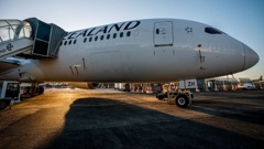 Air New Zealand passengers were forced to endure long waits on an aircraft and a shuttle bus due to inclement weather conditions. Photo / Michael Craig