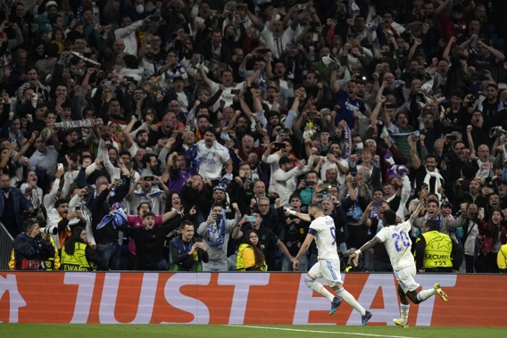 Karim Benzema scores the go-ahead goal vs Manchester City. (Photo / AP)