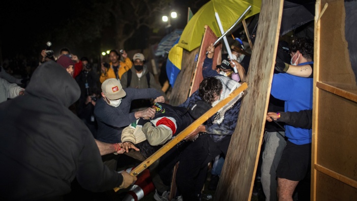 Demonstrators clash at a pro-Palestinian encampment at UCLA early Wednesday, May 1, 2024, in Los Angeles. Photo / AP Photo | Ethan Swope