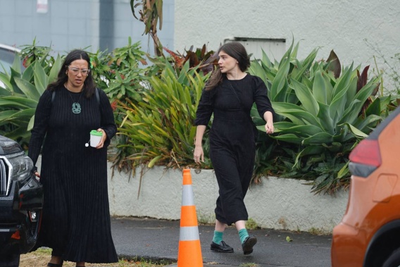 Green MPs Chlöe Swarbrick (right) and Kahurangi Carter arrive at Tīpene Funerals on Hill St in Onehunga to farewell Green MP Fa’anānā Efeso Collins. Photo / Michael Craig