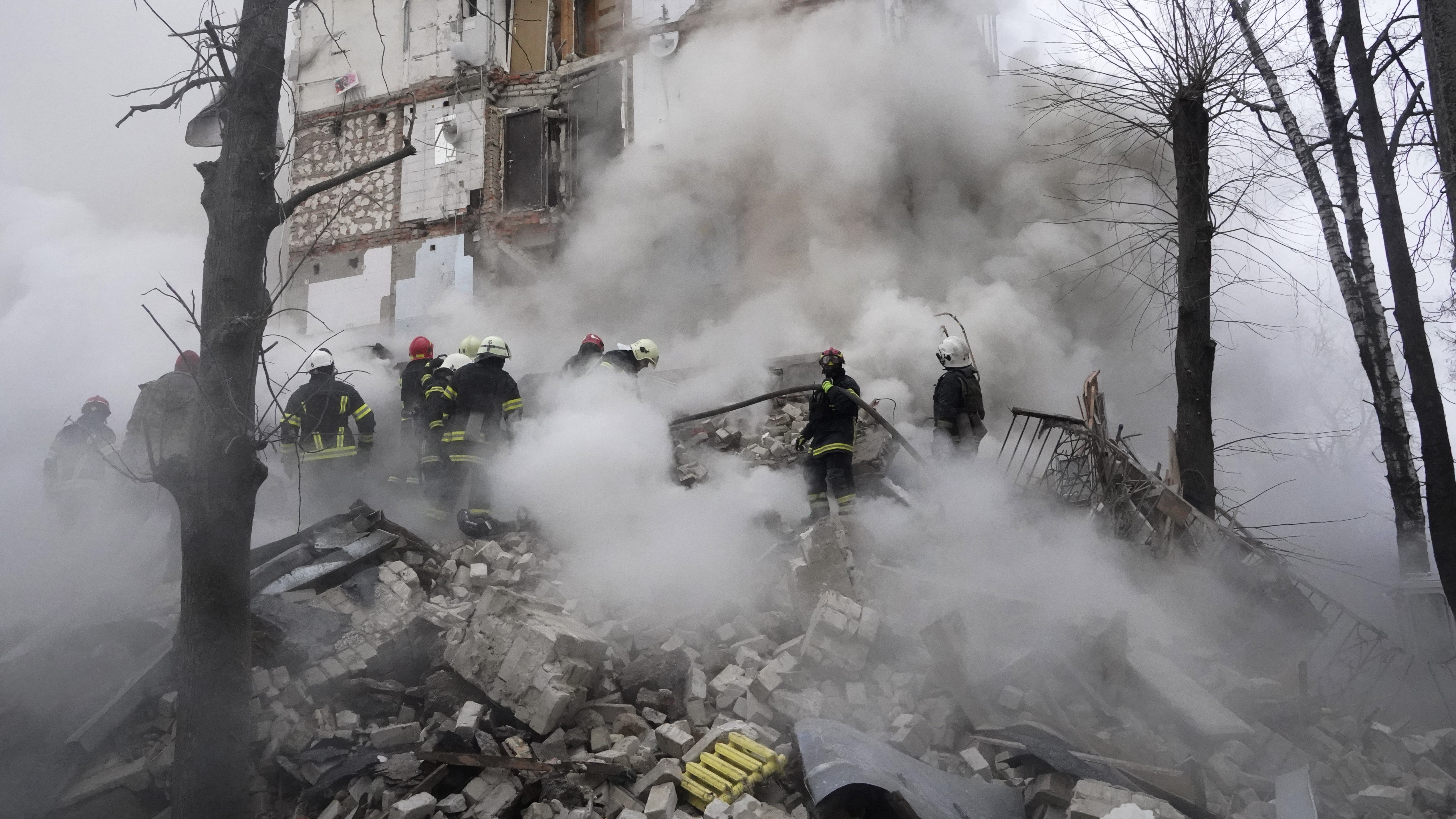 Rescuers work at the scene of a building damaged by Russian rocket attack in Kharkiv, Ukraine, Tuesday, Jan. 23, 2024. Photo / AP