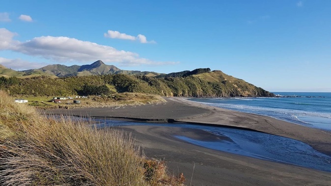 The family's vehicle was found at Kiritehere beach on Saturday.